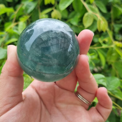 Green Fluorite Sphere With Snowflake Inclusions